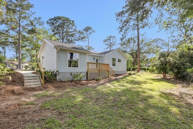 1602 Carruthers St, Tallahassee, FL 32308 - rear view of house with a lawn