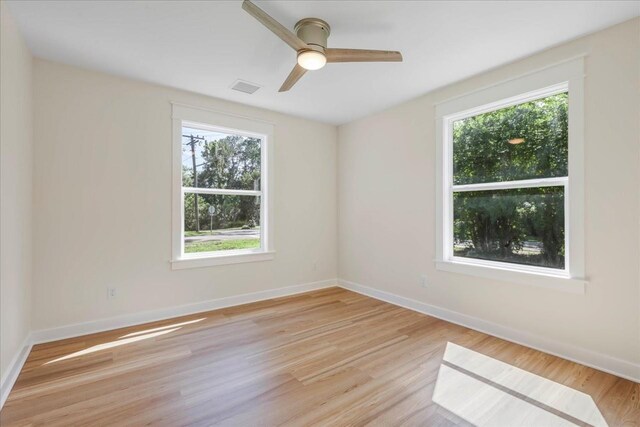 1602 Carruthers St, Tallahassee, FL 32308 - unfurnished room featuring a ceiling fan, light wood-style floors, and baseboards