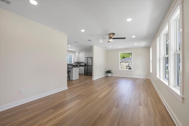 1602 Carruthers St, Tallahassee, FL 32308 - unfurnished living room featuring recessed lighting, a ceiling fan, baseboards, and light wood-style floors