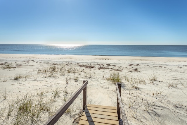 property view of water featuring a beach view