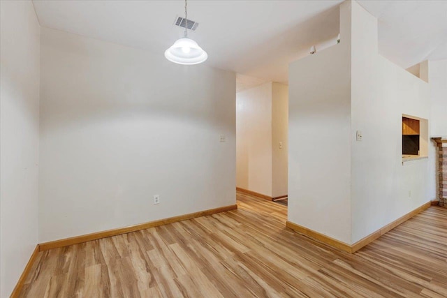 empty room featuring light hardwood / wood-style floors