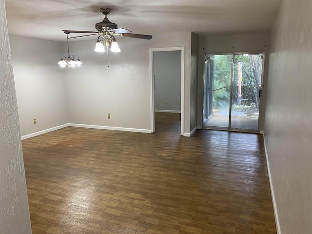 3722 Sutor Ct, Tallahassee, FL 32311 - empty room featuring dark wood-style flooring, a ceiling fan, and a chandelier
