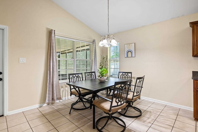 3224 Lord Murphy Trl, Tallahassee, FL 32309 - dining area with lofted ceiling, baseboards, an inviting chandelier, and light tile patterned floors