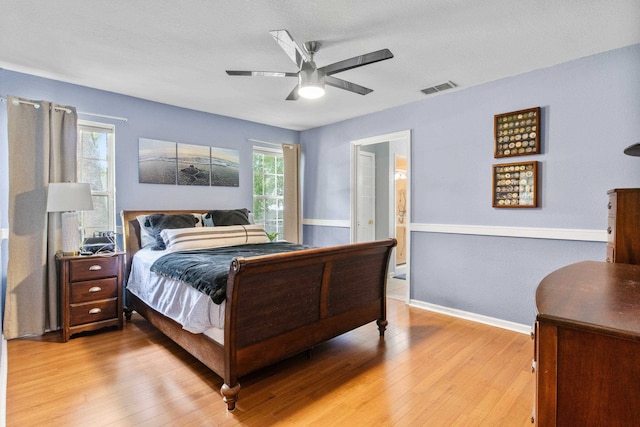 3224 Lord Murphy Trl, Tallahassee, FL 32309 - bedroom with baseboards, ceiling fan, light wood finished floors, and visible vents