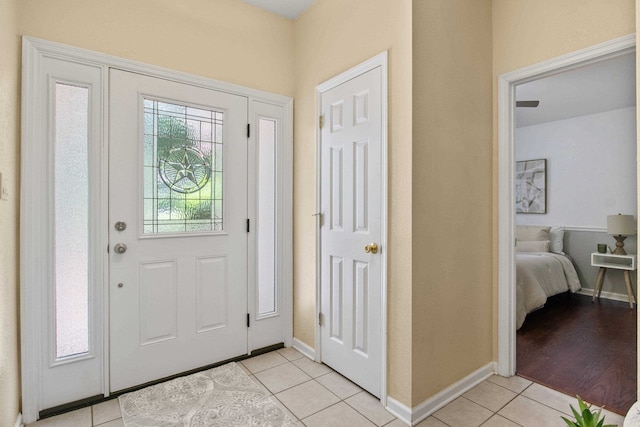 3224 Lord Murphy Trl, Tallahassee, FL 32309 - entryway featuring light tile patterned floors and baseboards
