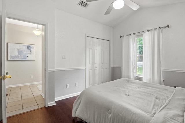 3224 Lord Murphy Trl, Tallahassee, FL 32309 - bedroom featuring a ceiling fan, vaulted ceiling, a closet, visible vents, and wood finished floors