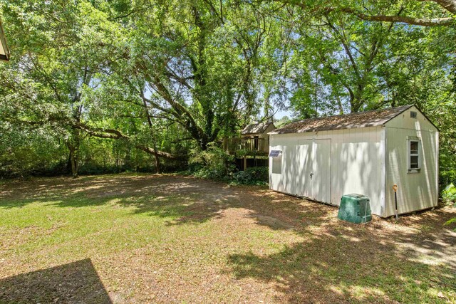 3224 Lord Murphy Trl, Tallahassee, FL 32309 - view of yard with an outdoor structure and a storage shed
