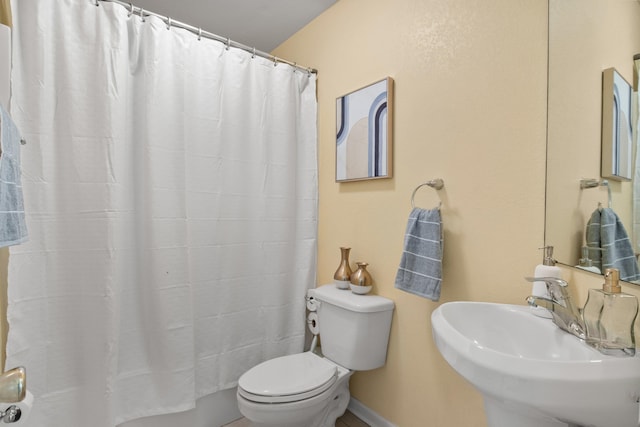 3224 Lord Murphy Trl, Tallahassee, FL 32309 - full bath with toilet, baseboards, a sink, and curtained shower