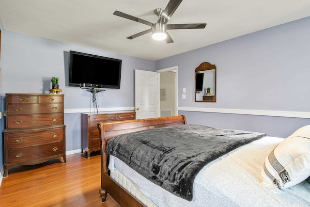 3224 Lord Murphy Trl, Tallahassee, FL 32309 - bedroom featuring baseboards, a ceiling fan, and light wood-style floors