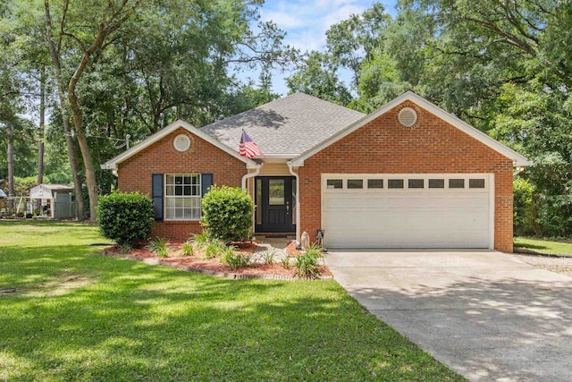 3224 Lord Murphy Trl, Tallahassee, FL 32309 - ranch-style house with concrete driveway, brick siding, a front yard, and a garage