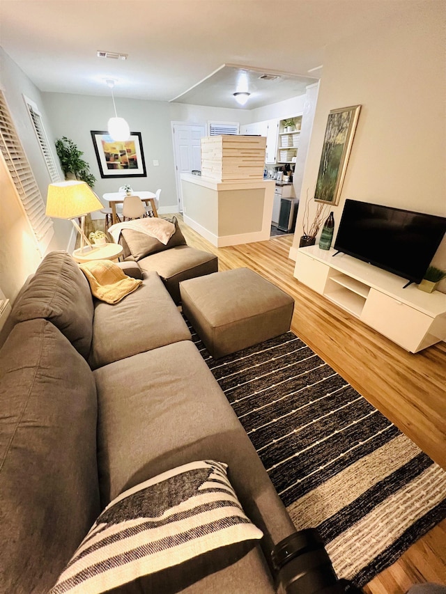 living room with hardwood / wood-style floors