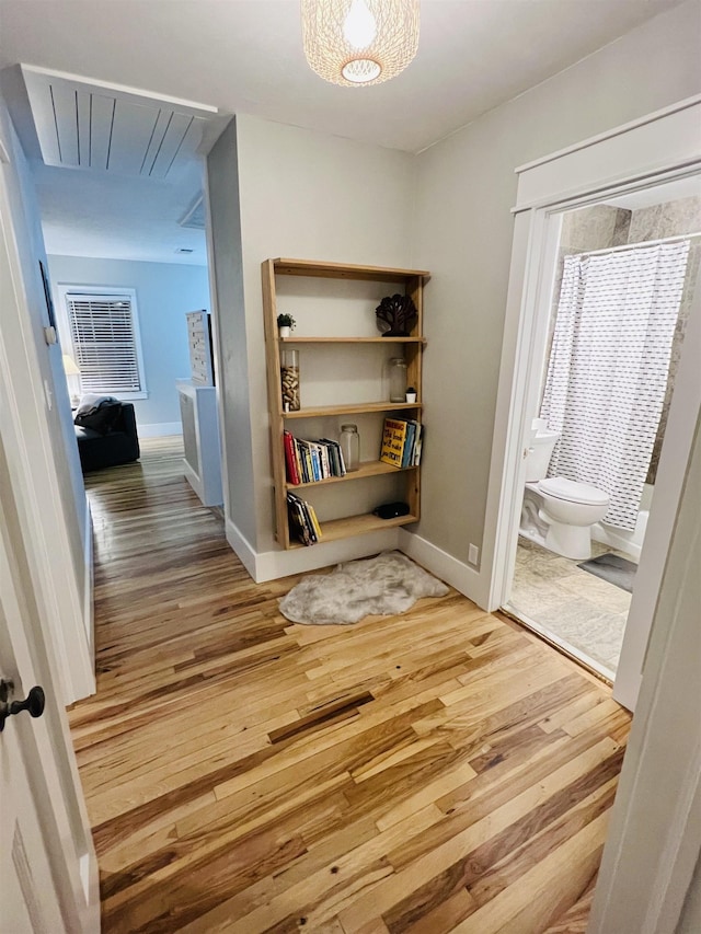 hall featuring hardwood / wood-style floors