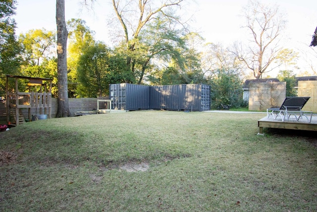 view of yard with a deck