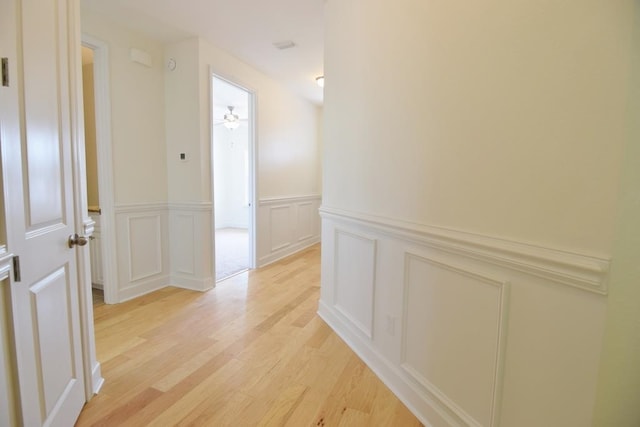 hallway featuring light wood-type flooring