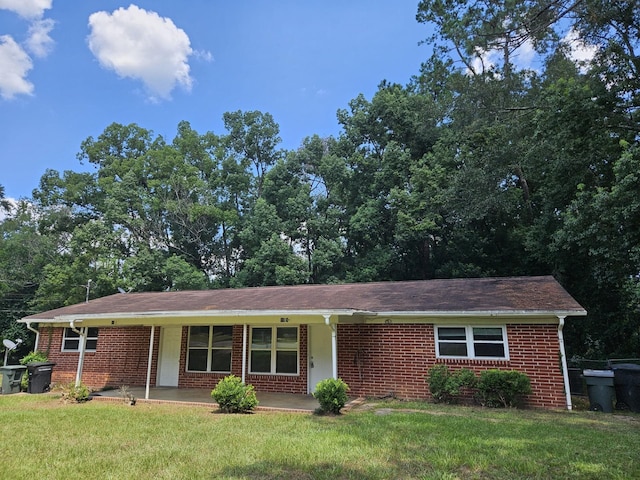 single story home featuring a front yard and a porch