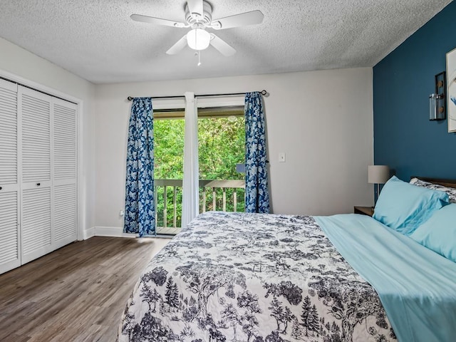 2271 Green Timbers Trl Unit B, Tallahassee, FL 32304 - bedroom with a textured ceiling, wood finished floors, a ceiling fan, a closet, and access to exterior