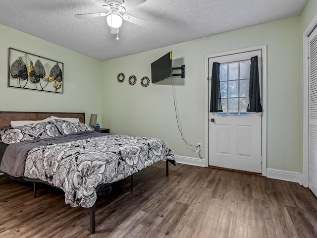 2271 Green Timbers Trl Unit B, Tallahassee, FL 32304 - bedroom with wood finished floors, a textured ceiling, and a ceiling fan