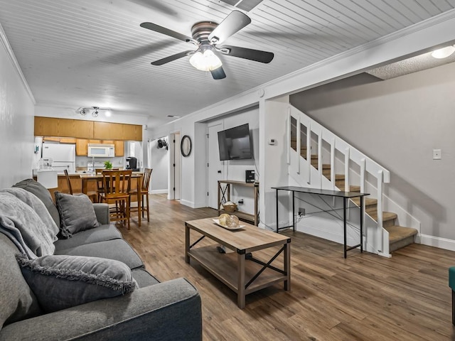 2271 Green Timbers Trl Unit B, Tallahassee, FL 32304 - living room with ornamental molding, a ceiling fan, stairs, and dark wood-style flooring