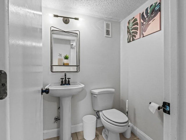 2271 Green Timbers Trl Unit B, Tallahassee, FL 32304 - bathroom featuring a textured ceiling and tile patterned floors