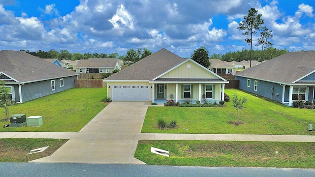 63 Windsor Way, Crawfordville, FL 32327 - traditional home with a porch, a residential view, concrete driveway, and an attached garage