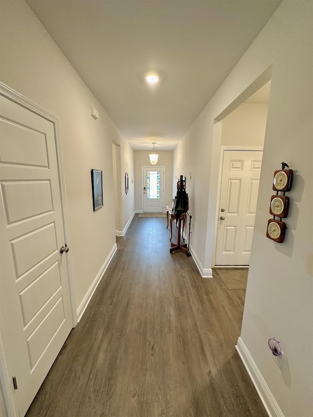 63 Windsor Way, Crawfordville, FL 32327 - hallway featuring dark wood-style floors and baseboards
