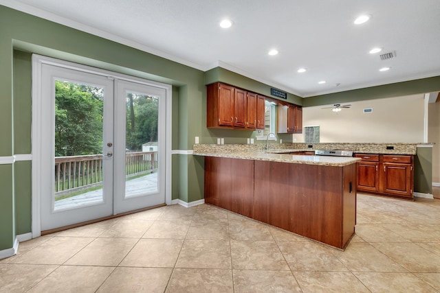 kitchen with french doors, crown molding, a peninsula, and visible vents