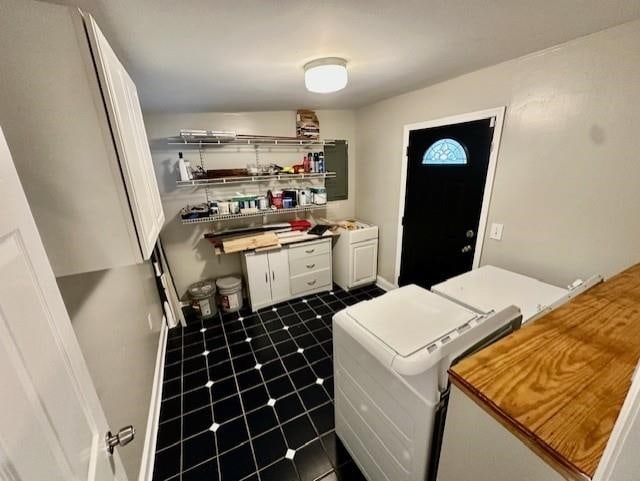 laundry room featuring separate washer and dryer