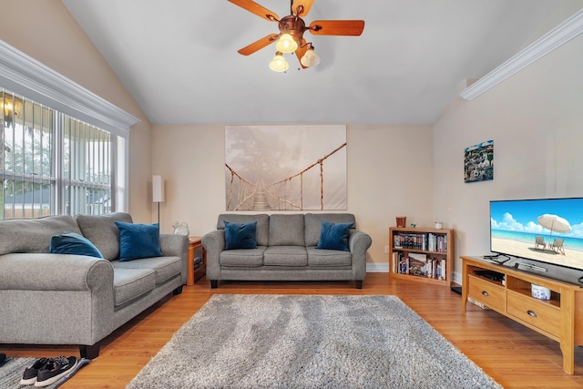 living room featuring hardwood / wood-style flooring, ceiling fan, and lofted ceiling