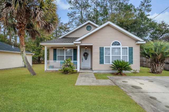 bungalow-style home with a front lawn and a porch