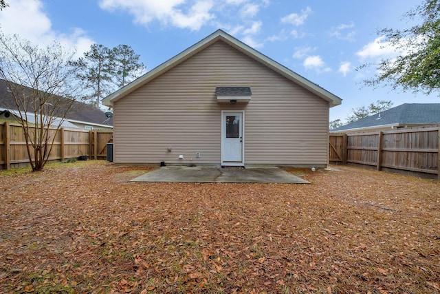 back of house with a patio area