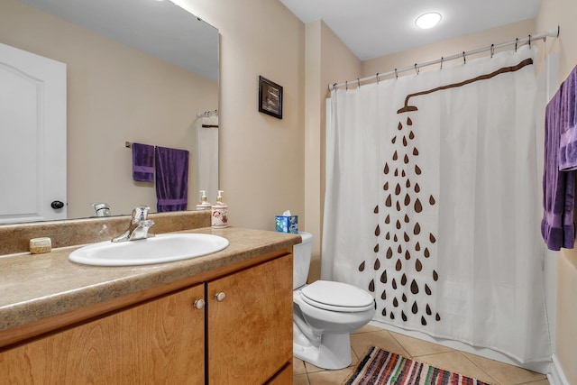 bathroom featuring a shower with curtain, vanity, toilet, and tile patterned flooring