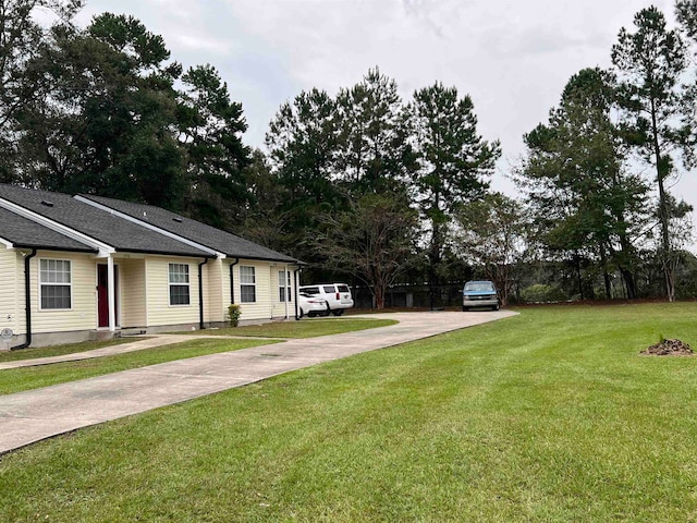 exterior space featuring a front yard