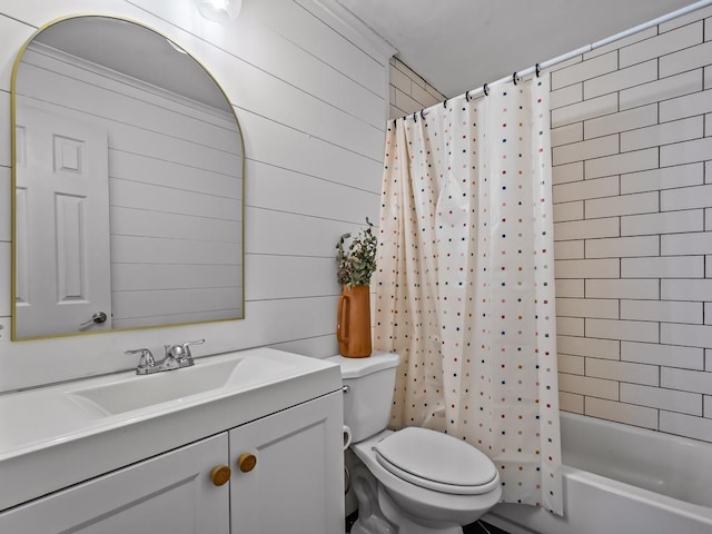 full bathroom with vanity, shower / bath combination with curtain, wooden walls, and toilet