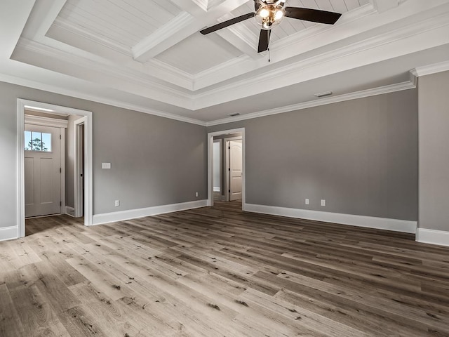 empty room with hardwood / wood-style flooring, ceiling fan, and ornamental molding