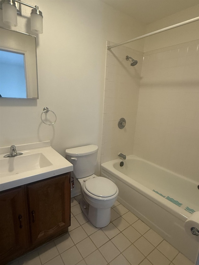 bathroom with toilet, tile patterned floors, vanity, and bathing tub / shower combination