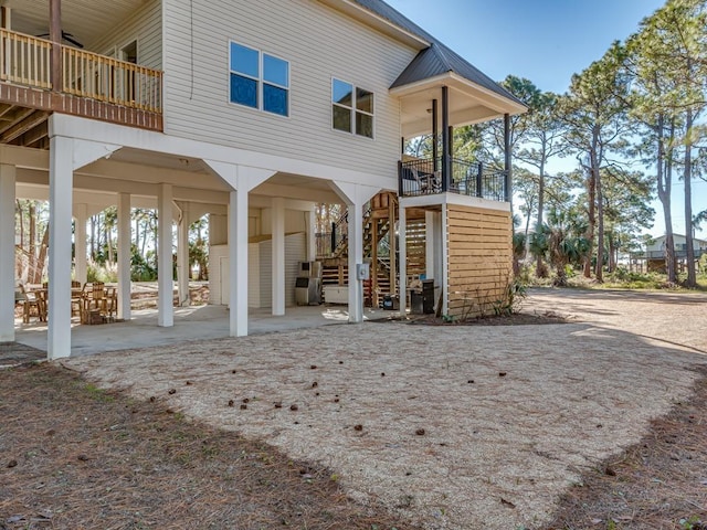 rear view of house featuring a patio area