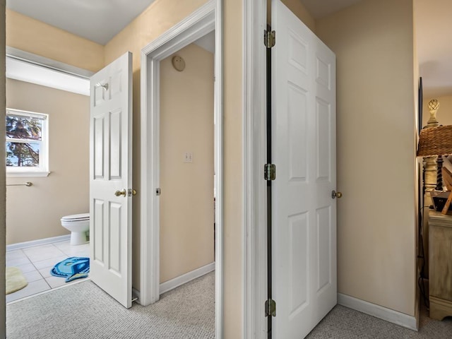 hallway with light tile patterned flooring