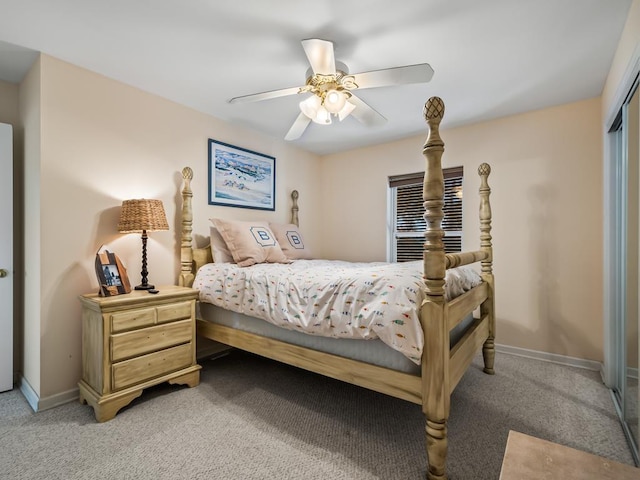 bedroom featuring carpet floors, a closet, and ceiling fan