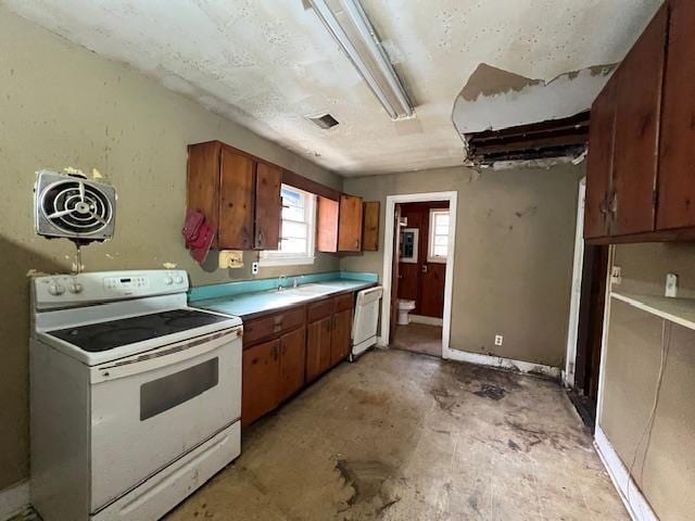 kitchen with sink and white appliances