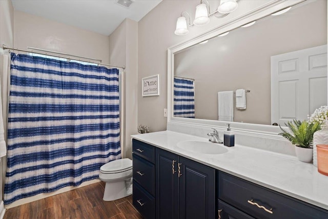 9816 Thunder Hill Trl, Tallahassee, FL 32312 - full bath with vanity, wood finished floors, and curtained shower
