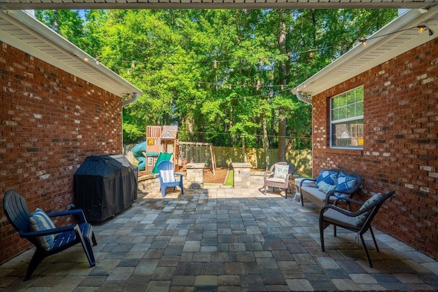 9816 Thunder Hill Trl, Tallahassee, FL 32312 - view of patio / terrace with area for grilling, an outdoor living space, and a playground