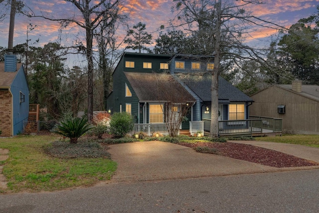 view of front of home with a deck