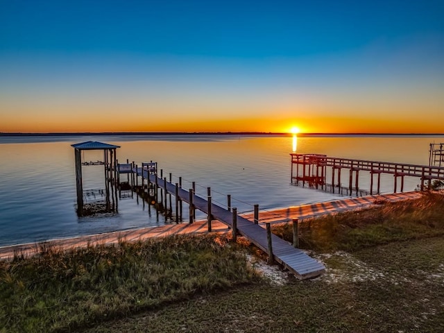 dock area with a water view