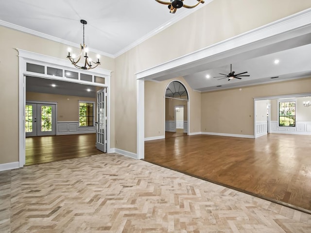 interior space with ornamental molding, light hardwood / wood-style flooring, and a healthy amount of sunlight