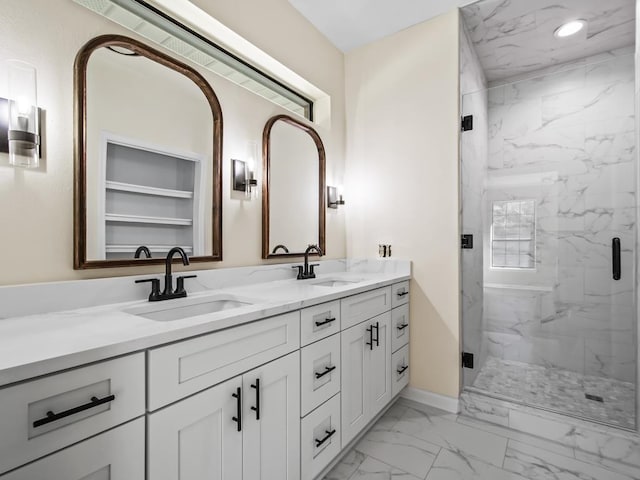 bathroom with vanity and an enclosed shower