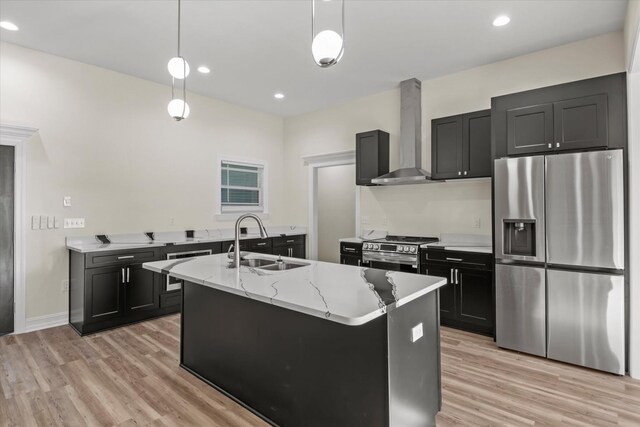 145 Oak Grove Ln, Quincy, FL 32351 - kitchen with stainless steel appliances, sink, pendant lighting, and wall chimney exhaust hood
