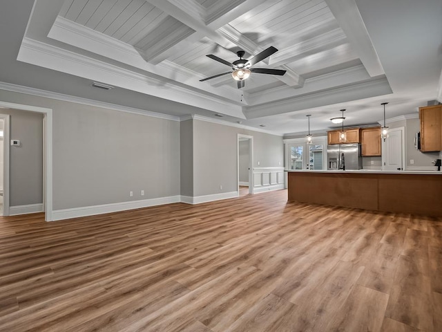 27 Spokan Trl, Crawfordville, FL 32327 - unfurnished living room with ornamental molding, light wood-type flooring, a ceiling fan, beamed ceiling, and coffered ceiling