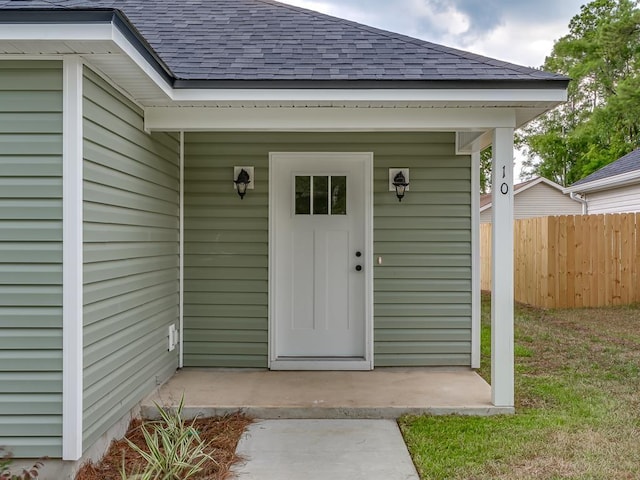 27 Spokan Trl, Crawfordville, FL 32327 - doorway to property with a shingled roof