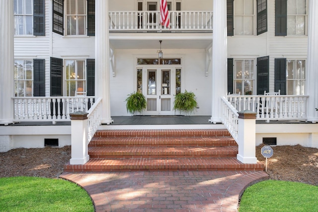 doorway to property featuring a balcony