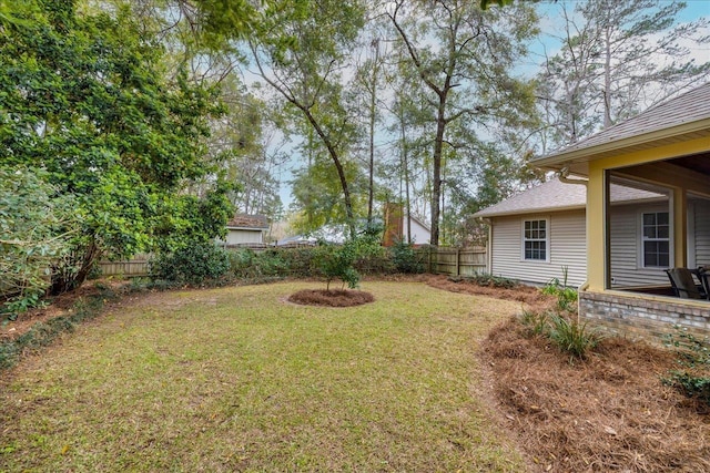 view of yard with fence